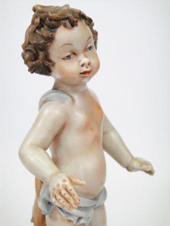 PUTTO CHILD FIGURE MADE IN CAPODIMONTE MARKED PORCELAIN