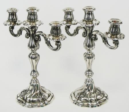 A PAIR OF REAL SILVER CANDLE HOLDERS FIRST HALF OF 20TH CENTURY